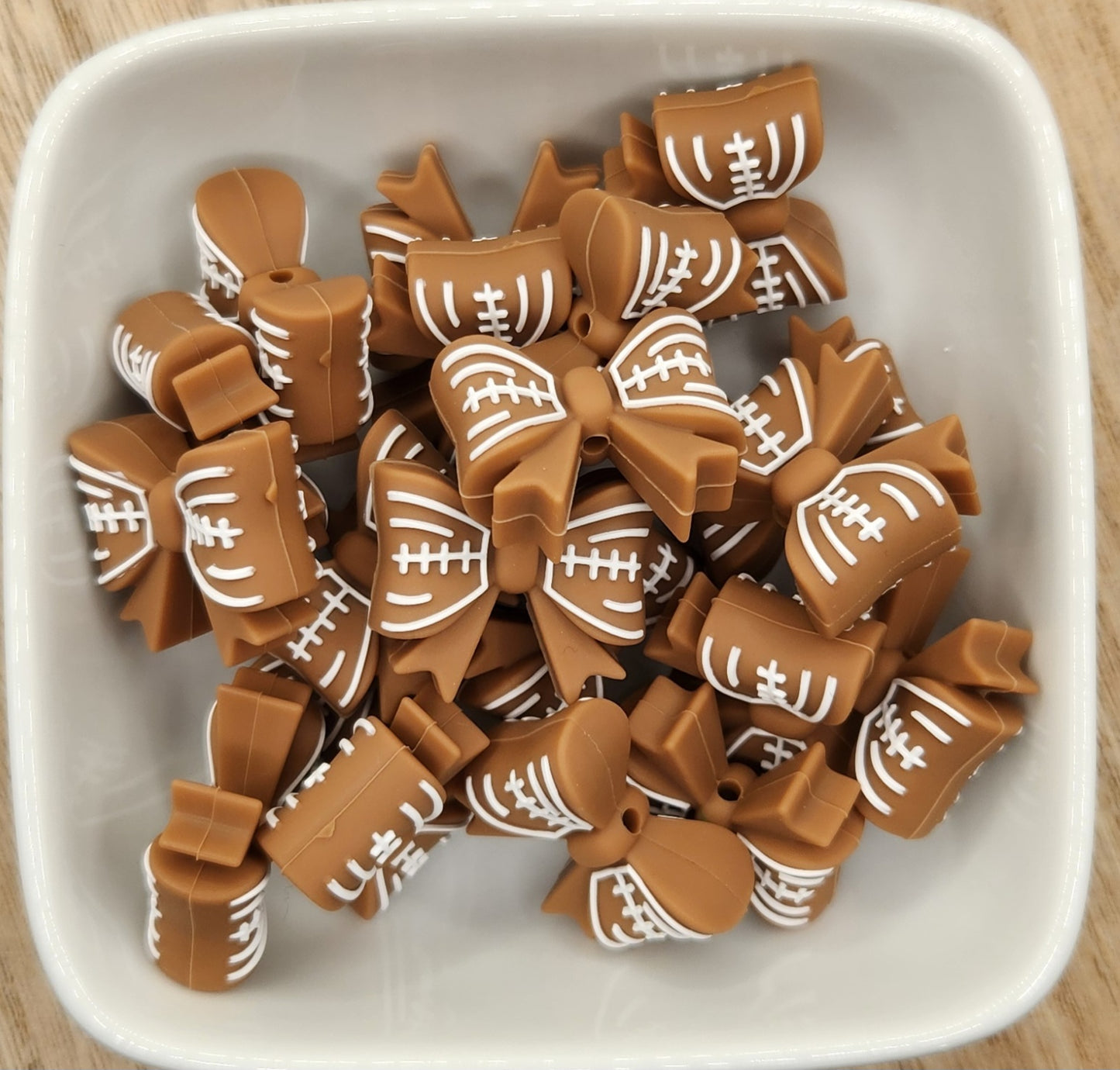 Football Bow Silicone focal bead